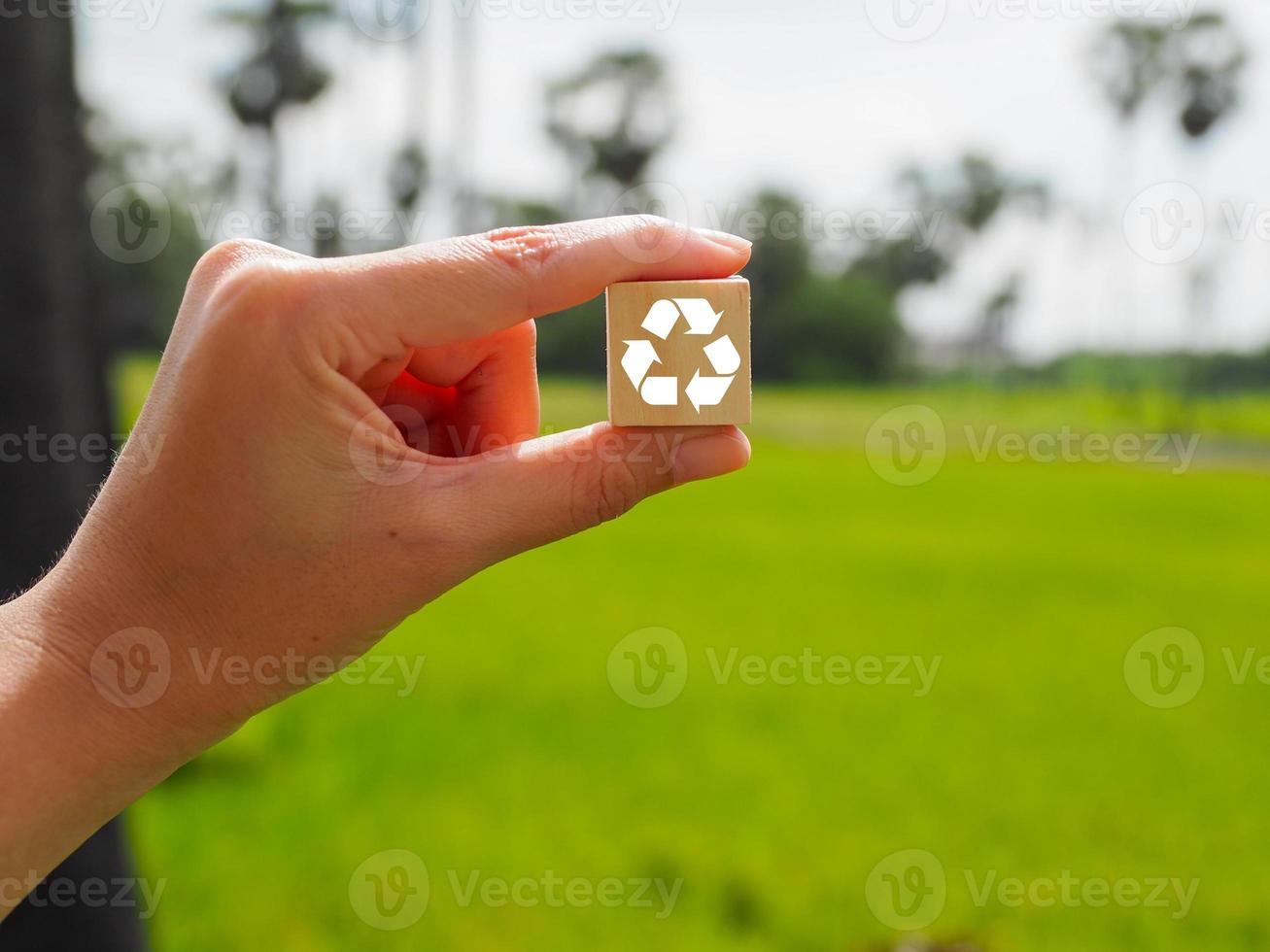 Recycle concept on wooden blocks, efficient use of resources. reuse and reuse photo