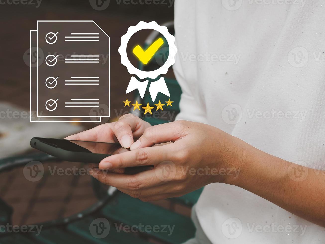 a young woman using a smartphone to check ISO certification and standard concepts with questionnaires or audits. photo