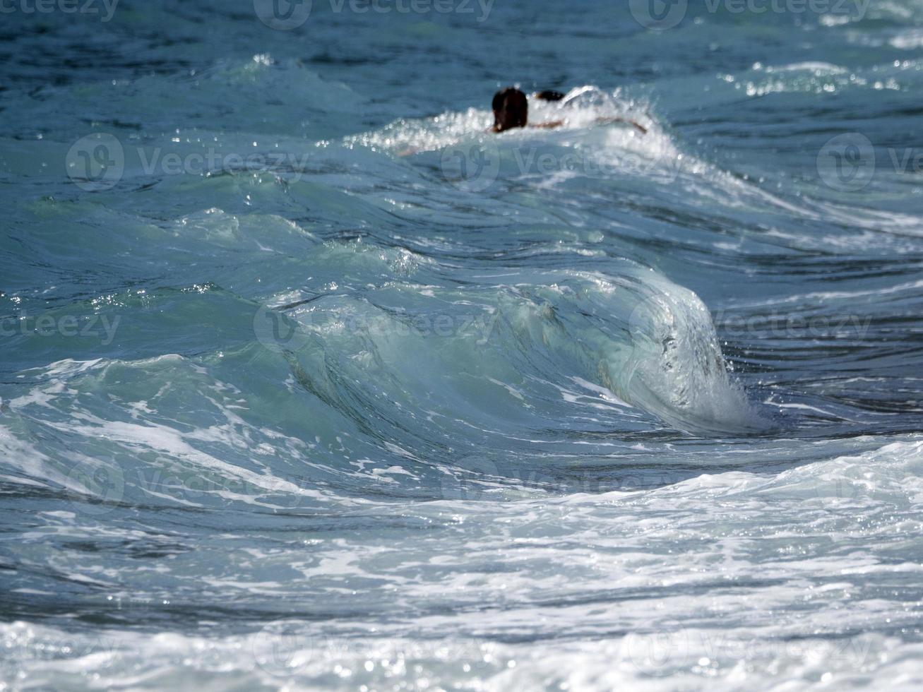Sea wave on the shore photo