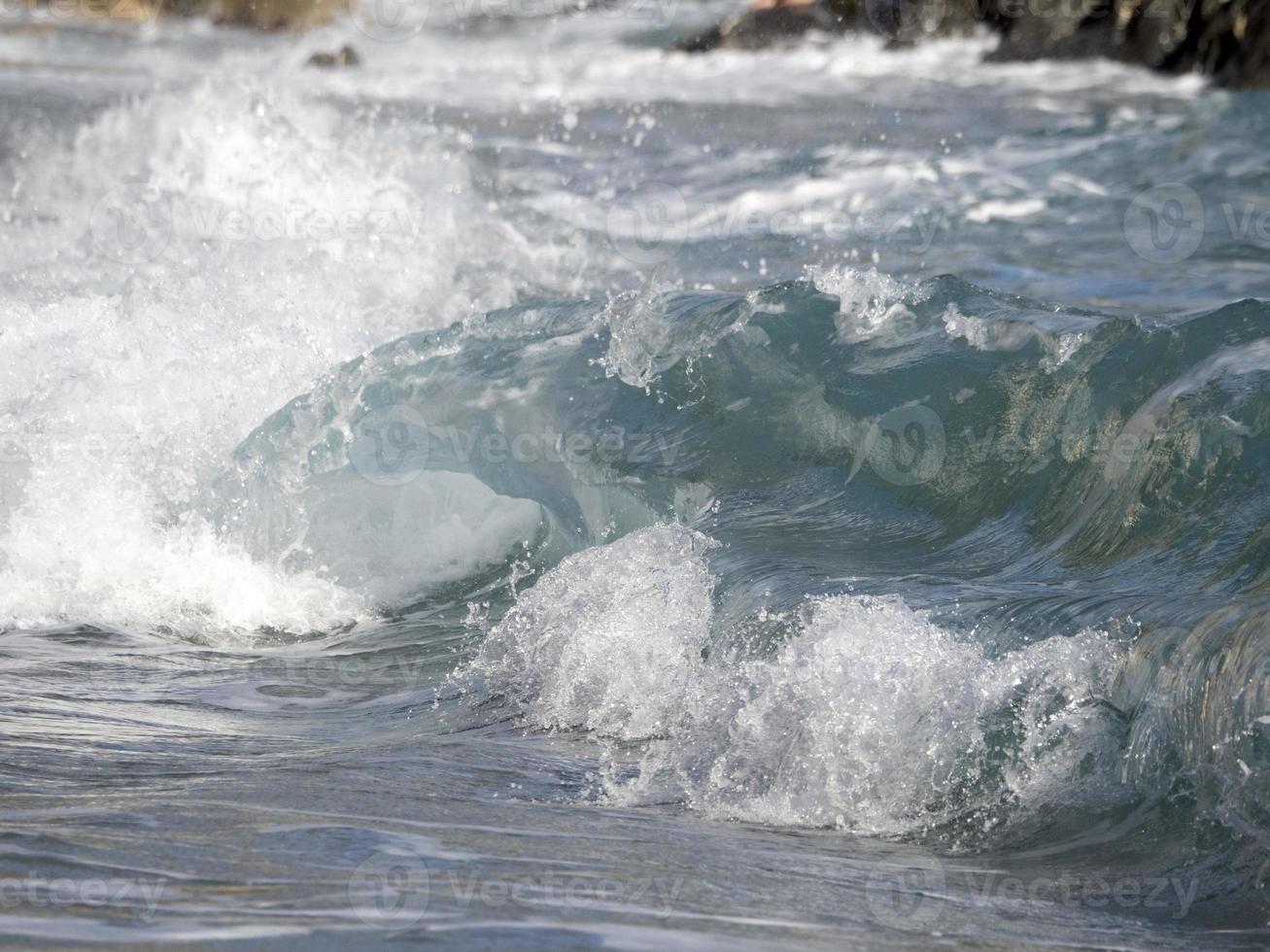 Sea wave on the shore photo