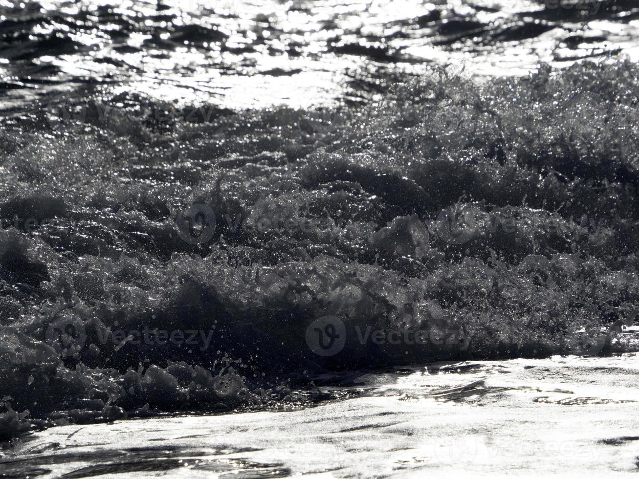 Sea wave on the shore photo