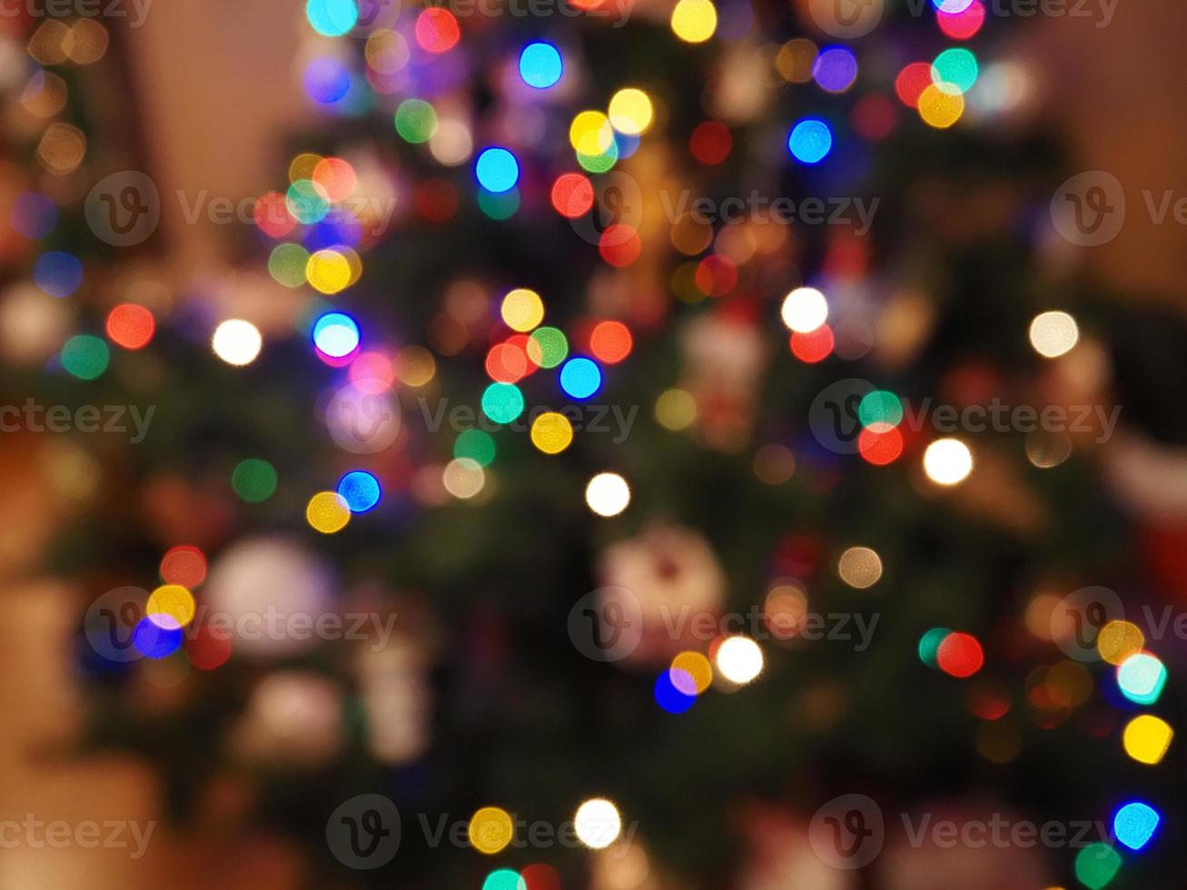 árbol de navidad luces desenfoque de fondo foto