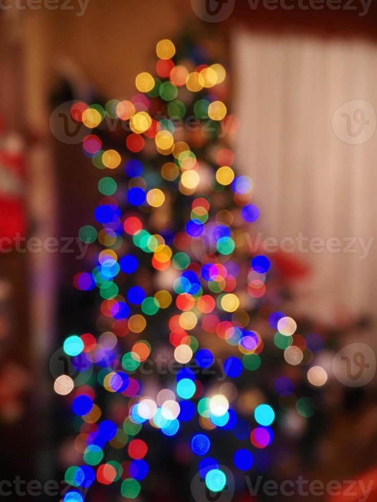 árbol de navidad luces desenfoque de fondo foto