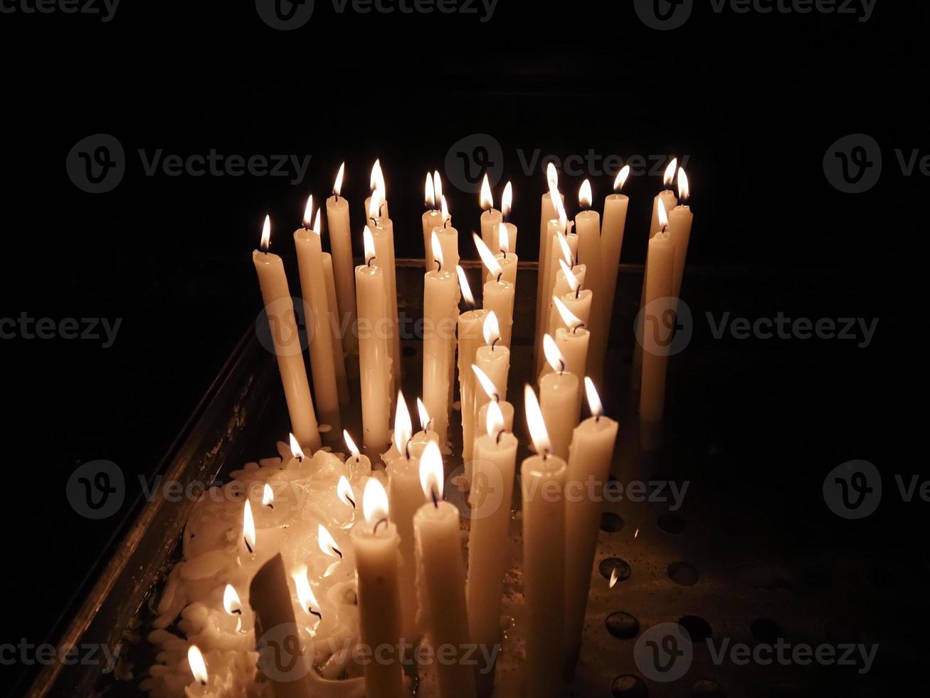 church votive candles white flames photo