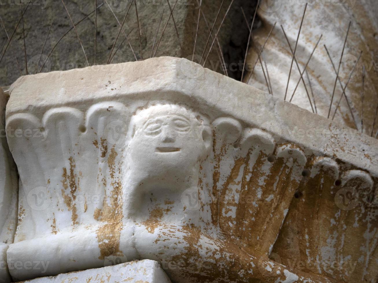 bas relief statue sculpture of church of riomaggiore cinque terre pictoresque village photo