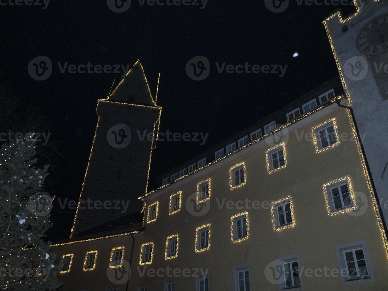 brunico village at night in december xmas lights photo