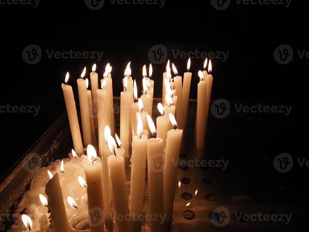 church votive candles white flames photo