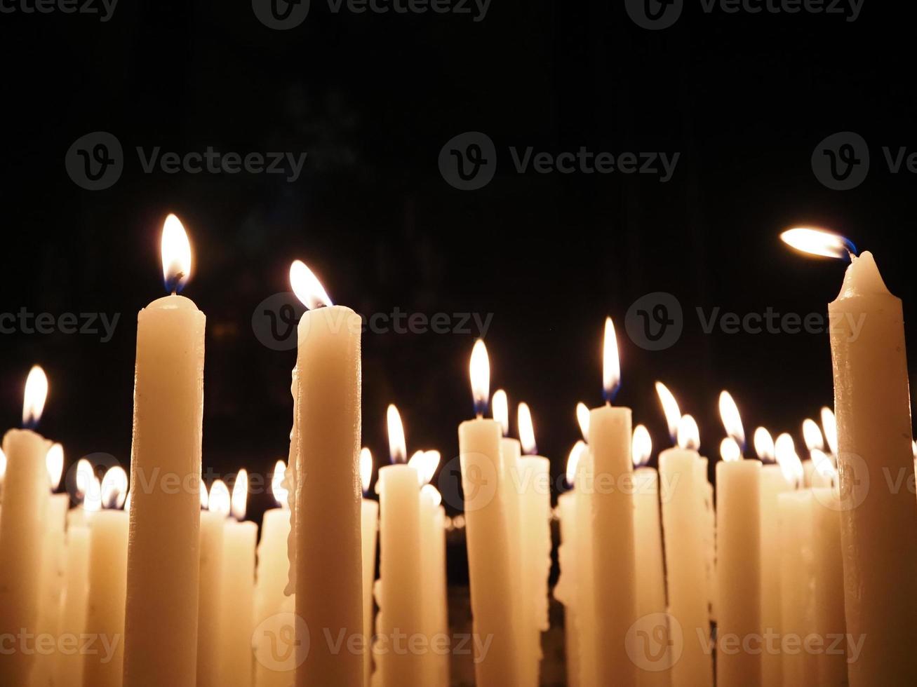 church votive candles white flames photo