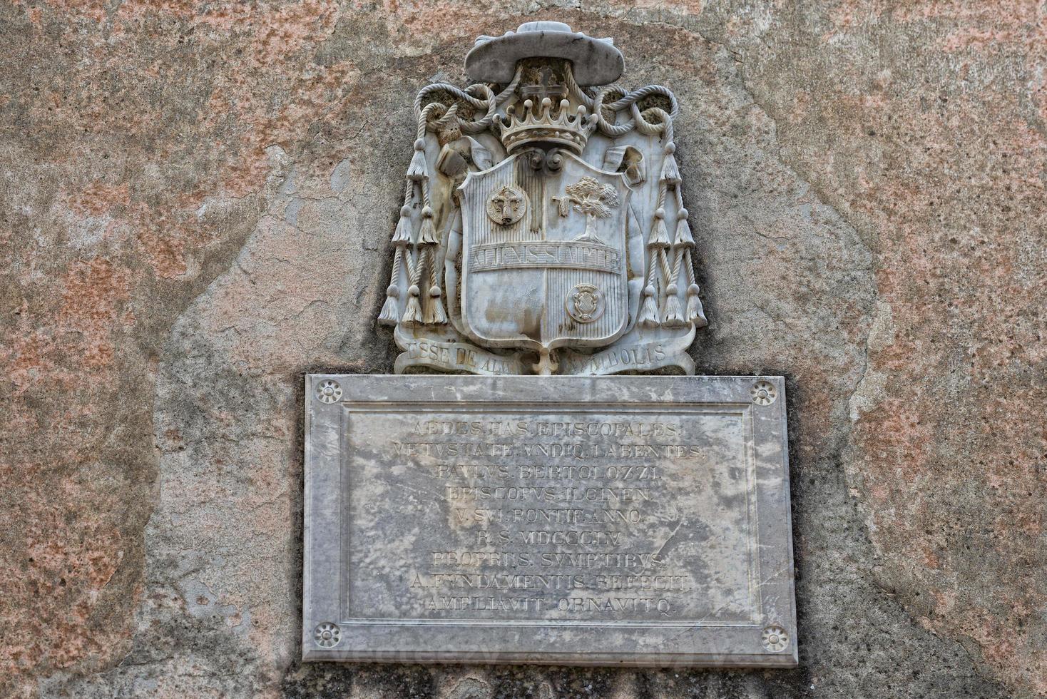 san quirico medieval houses stone wall vatican bas relief photo