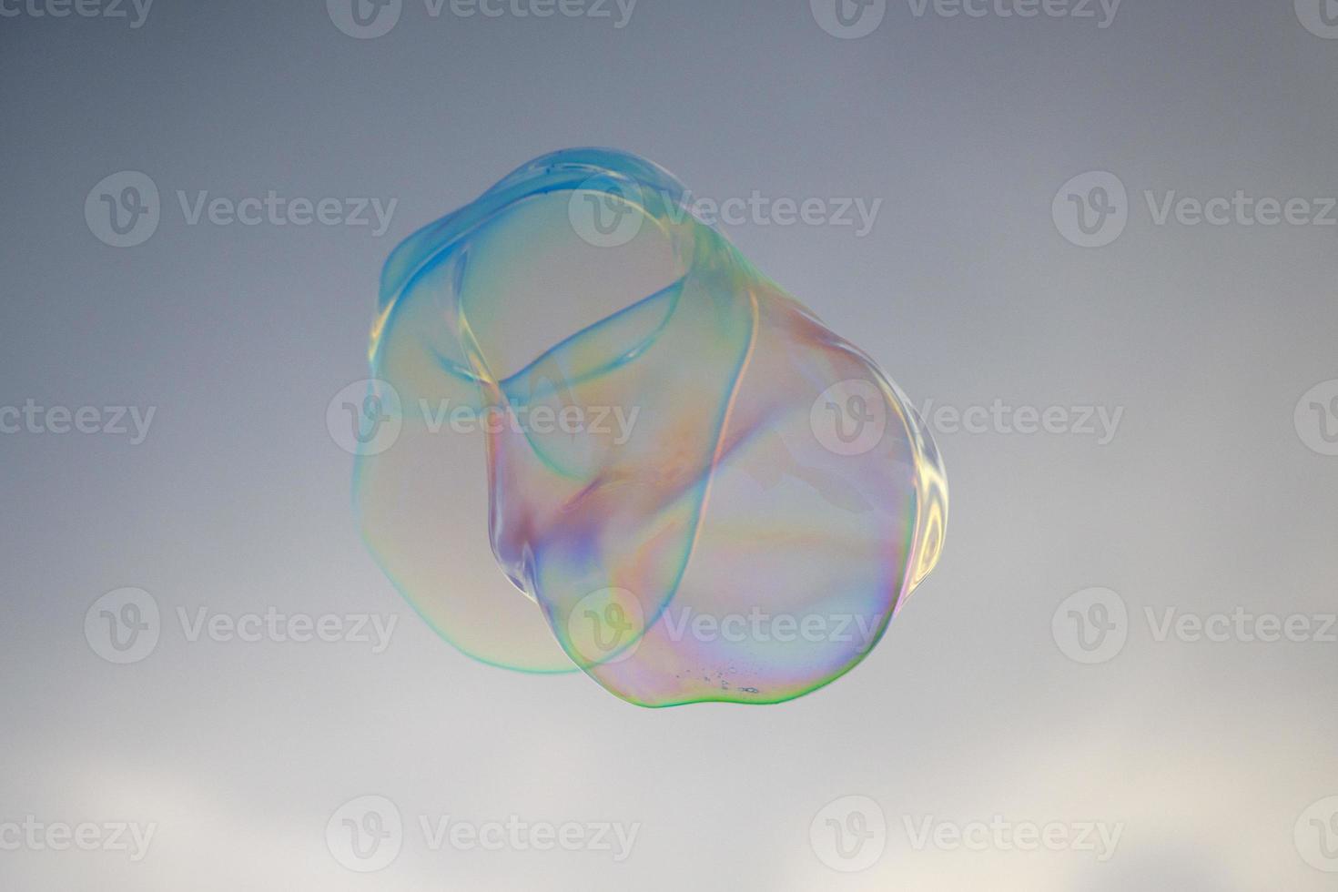 giant soap bubble rainbow colors photo