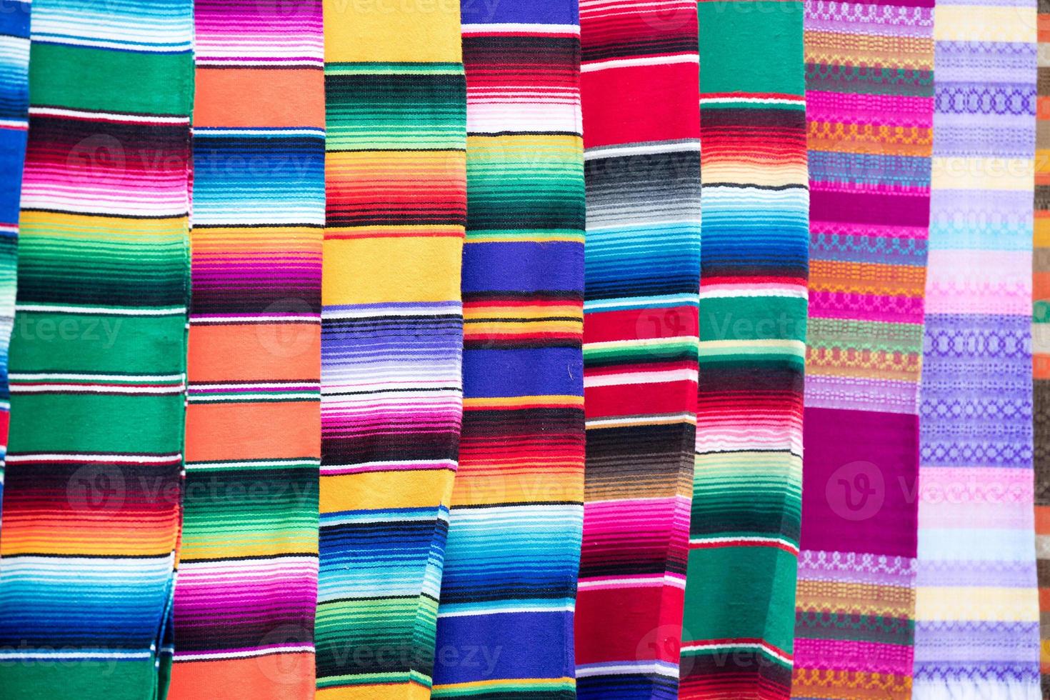 Different colors mexican fabric close up detail photo