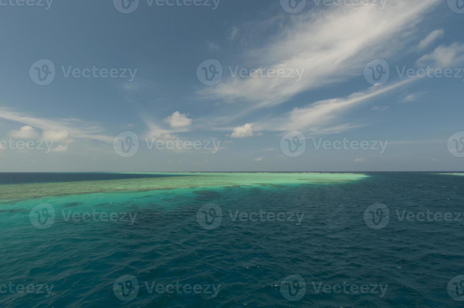 A colorful panorama of ocean and reef in Maldives photo