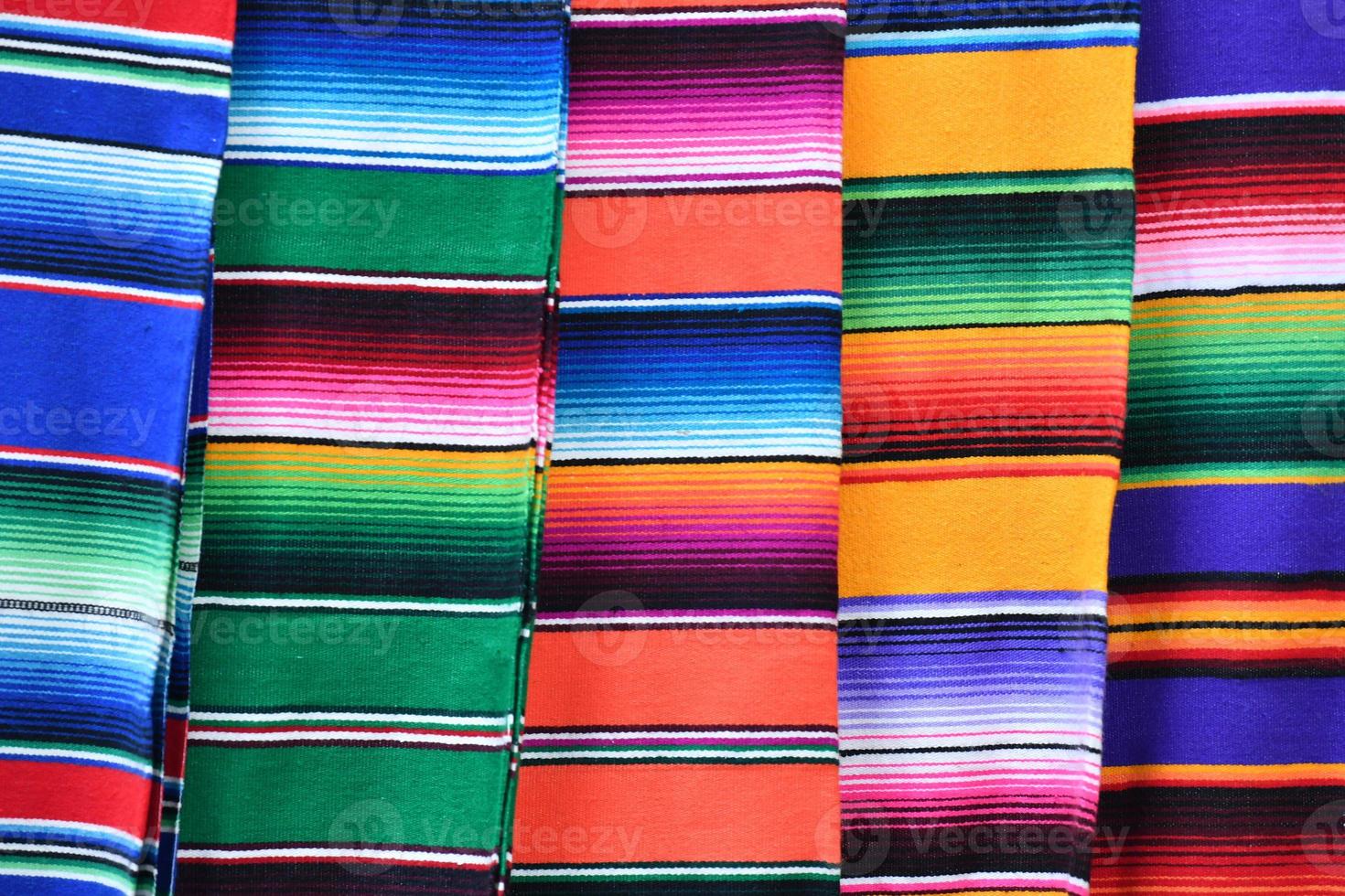 Different colors mexican fabric close up detail photo