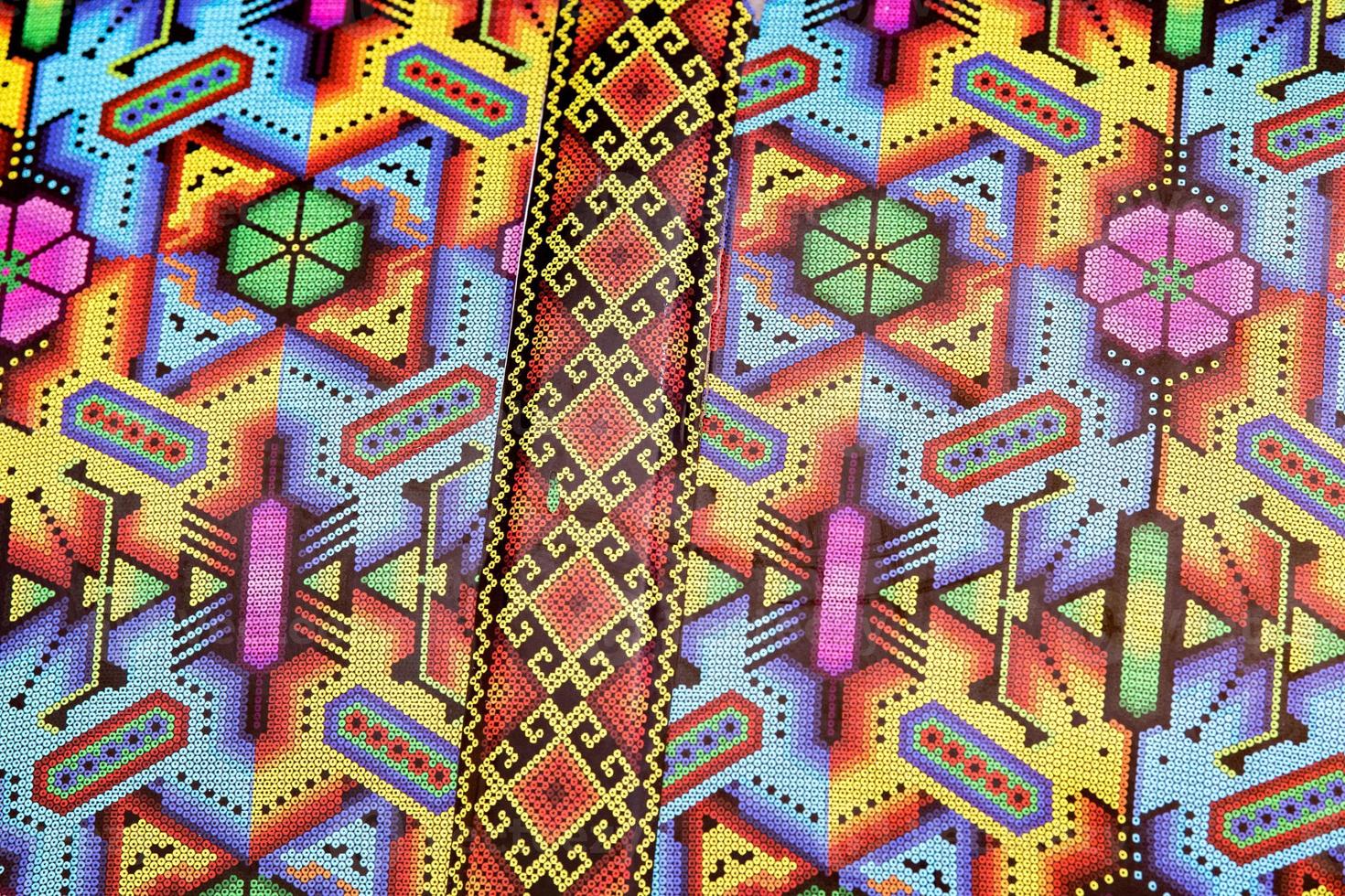 Different colors mexican fabric close up detail photo