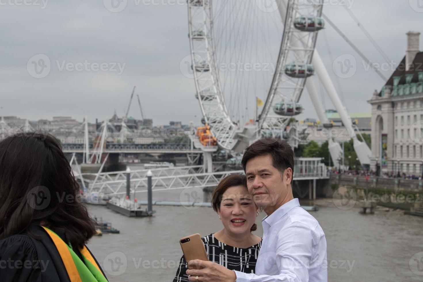 LONDON, ENGLAND - JULY 15 2017 - Tourist taking pictures at London Bridge photo