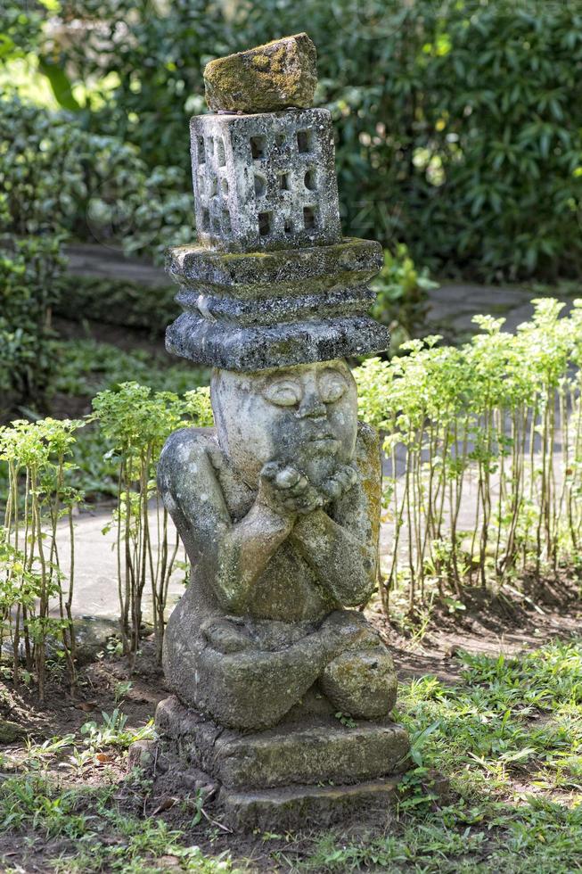 wooden tiki on tropical paradise beach photo