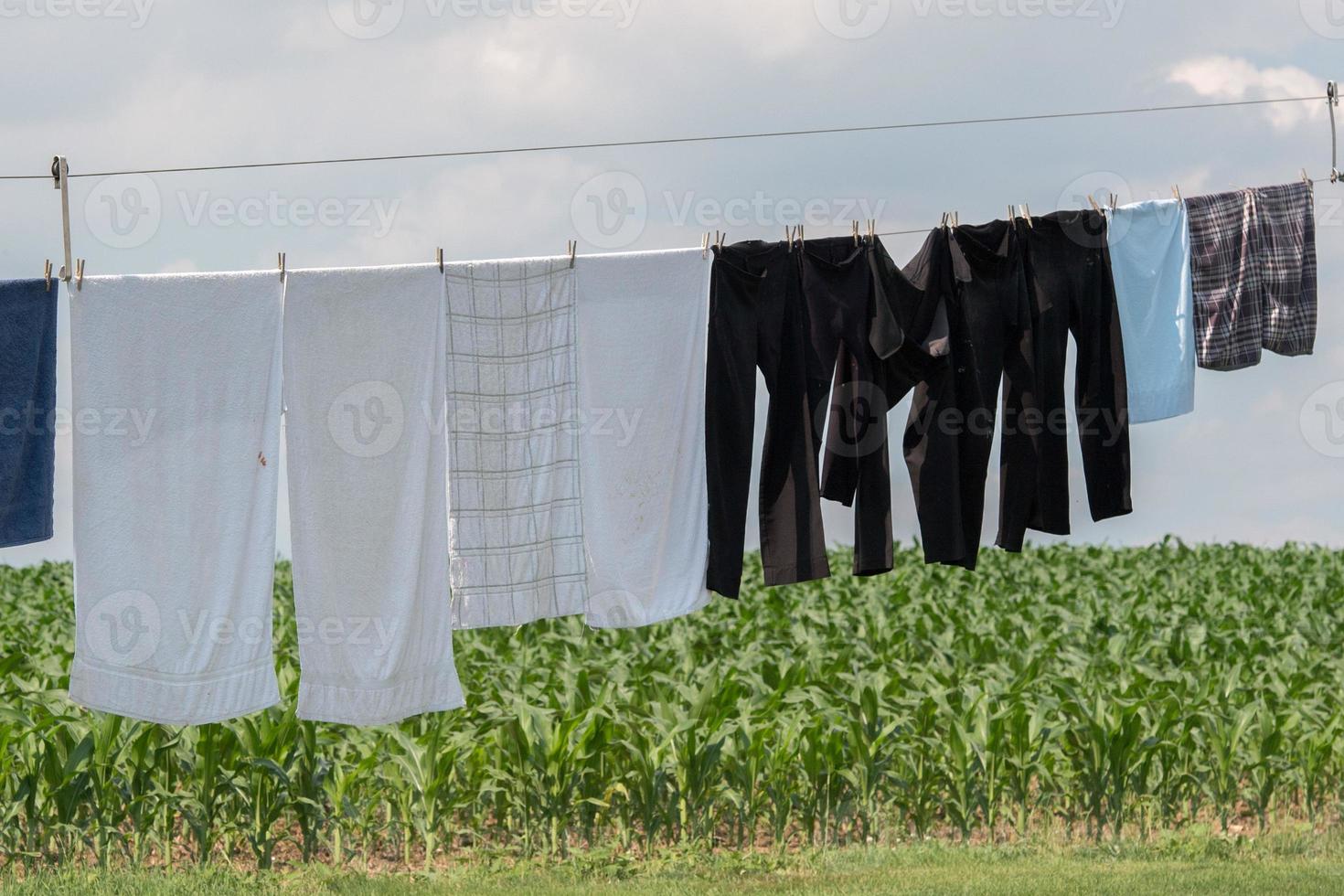 clothes hanging outside amish house in usa photo