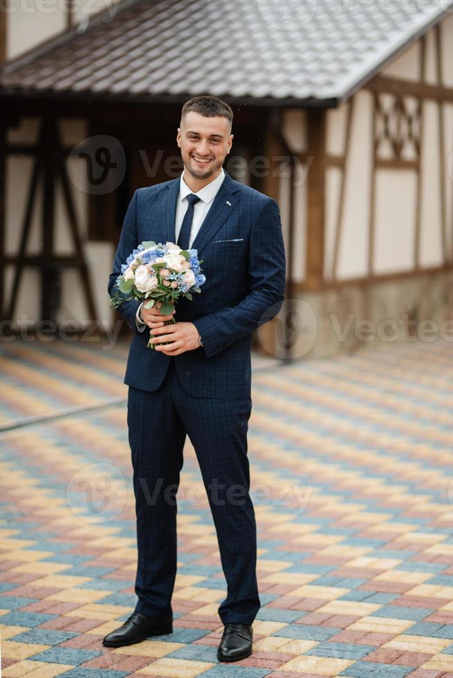 portrait of a bearded groom photo