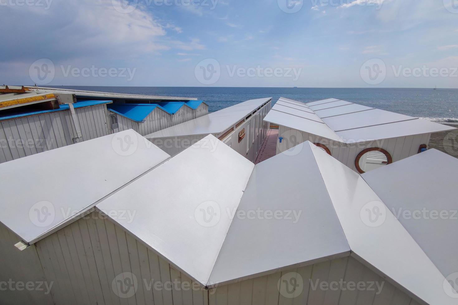Bathhouse beach club preparation set up for summer season in Italy photo