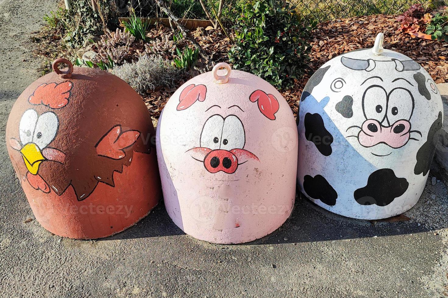 animal painted road bollard chicken pig cow photo