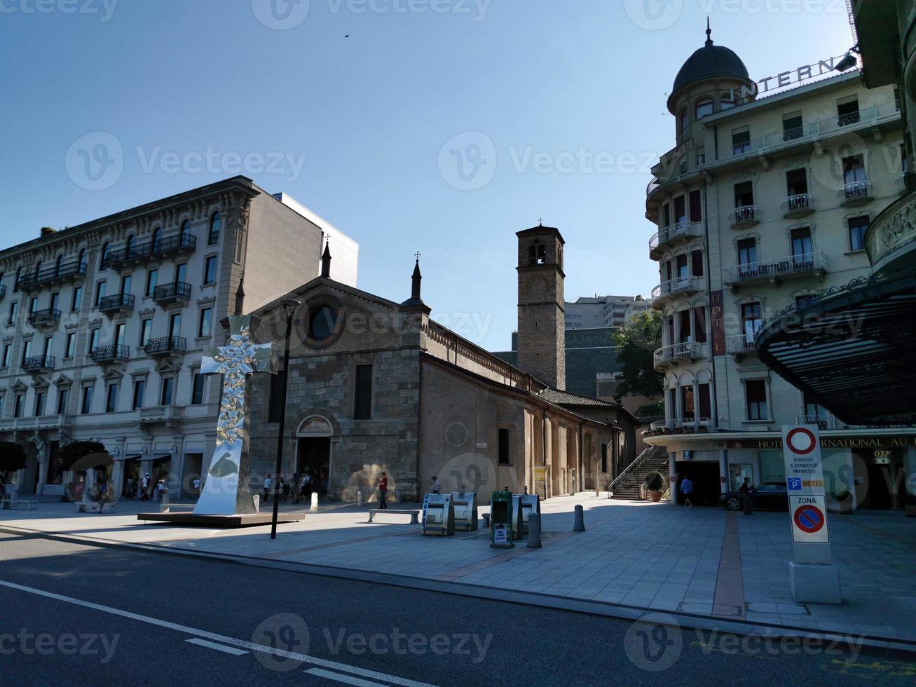 LUGANO, SWITZERLAND - JUNE 23 2019 - Lugano view cityscape from the lake full of people photo