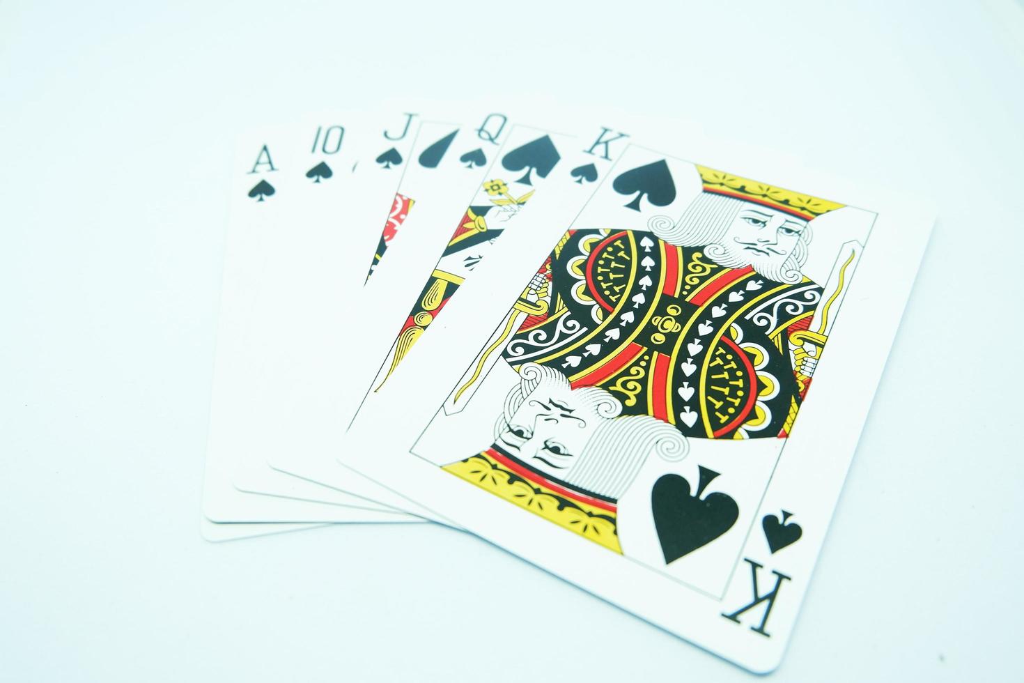 Spade Royal Flush ,All the same suit, sequence A K Q J T in White Background photo