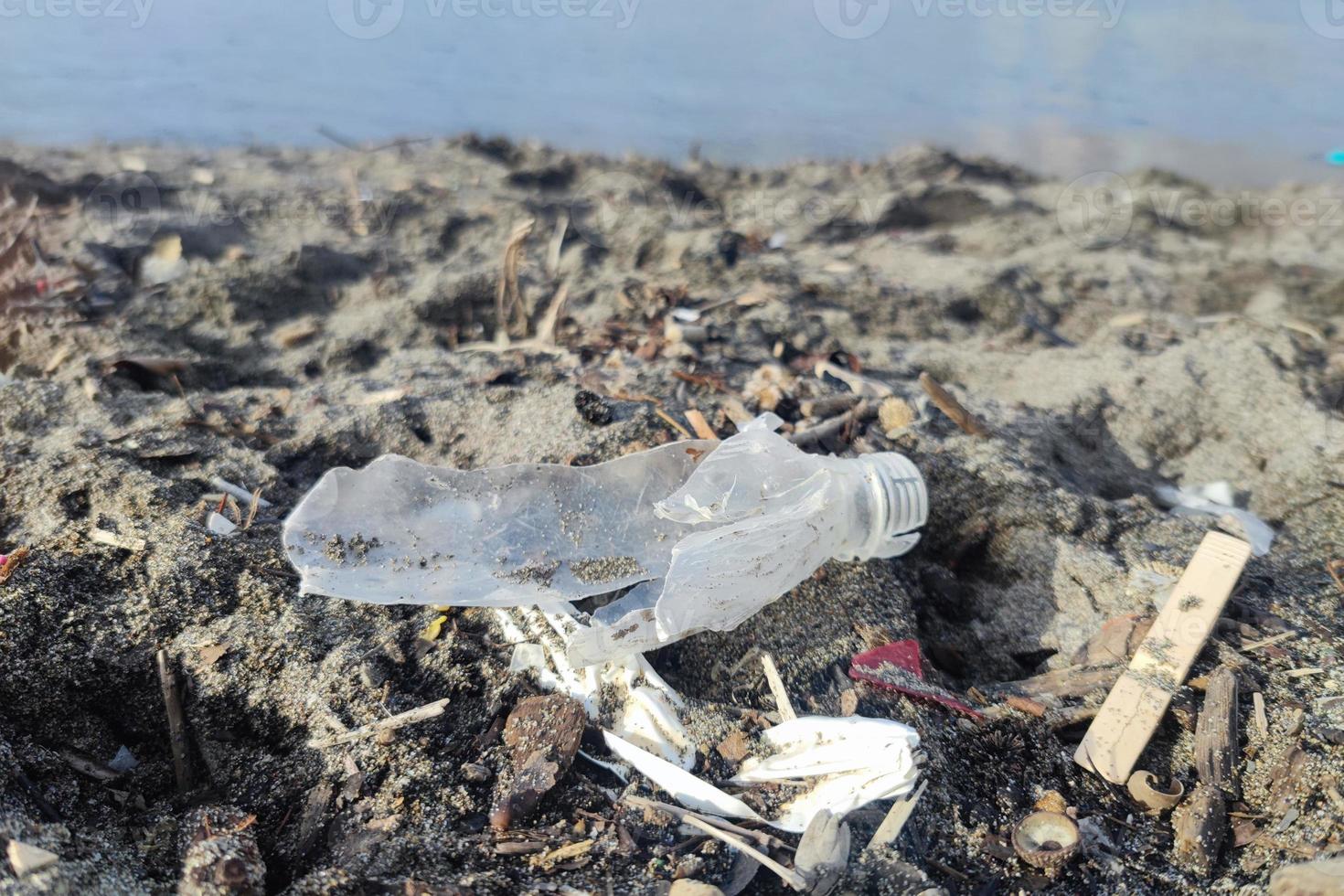 Plastic waste rubbish garbage on the beach photo