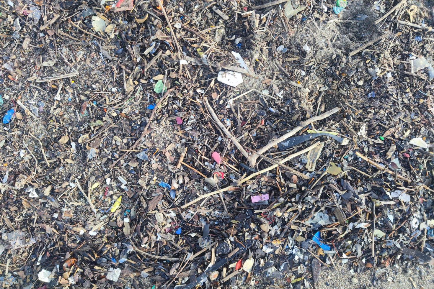 Plastic waste rubbish garbage on the beach photo