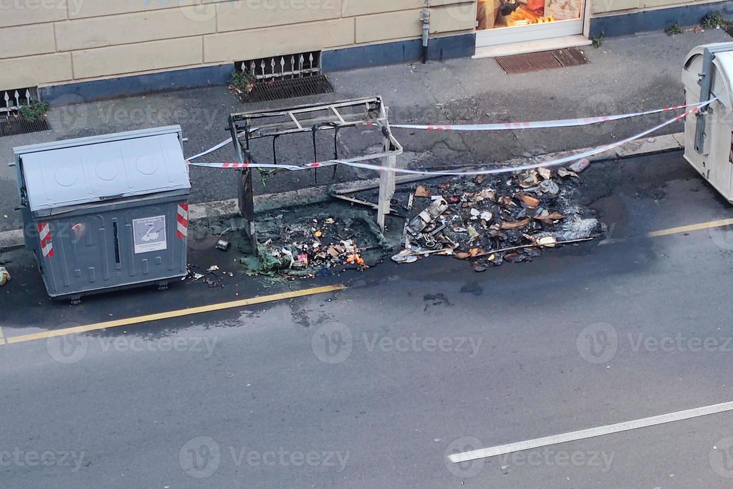 street garbage container fire burnt plastic recycle bin photo