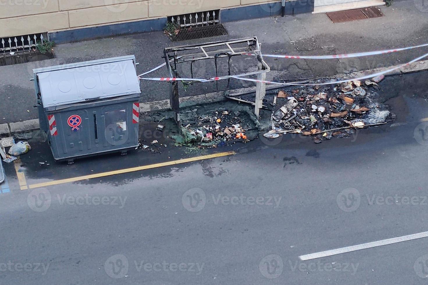 street garbage container fire burnt plastic recycle bin photo