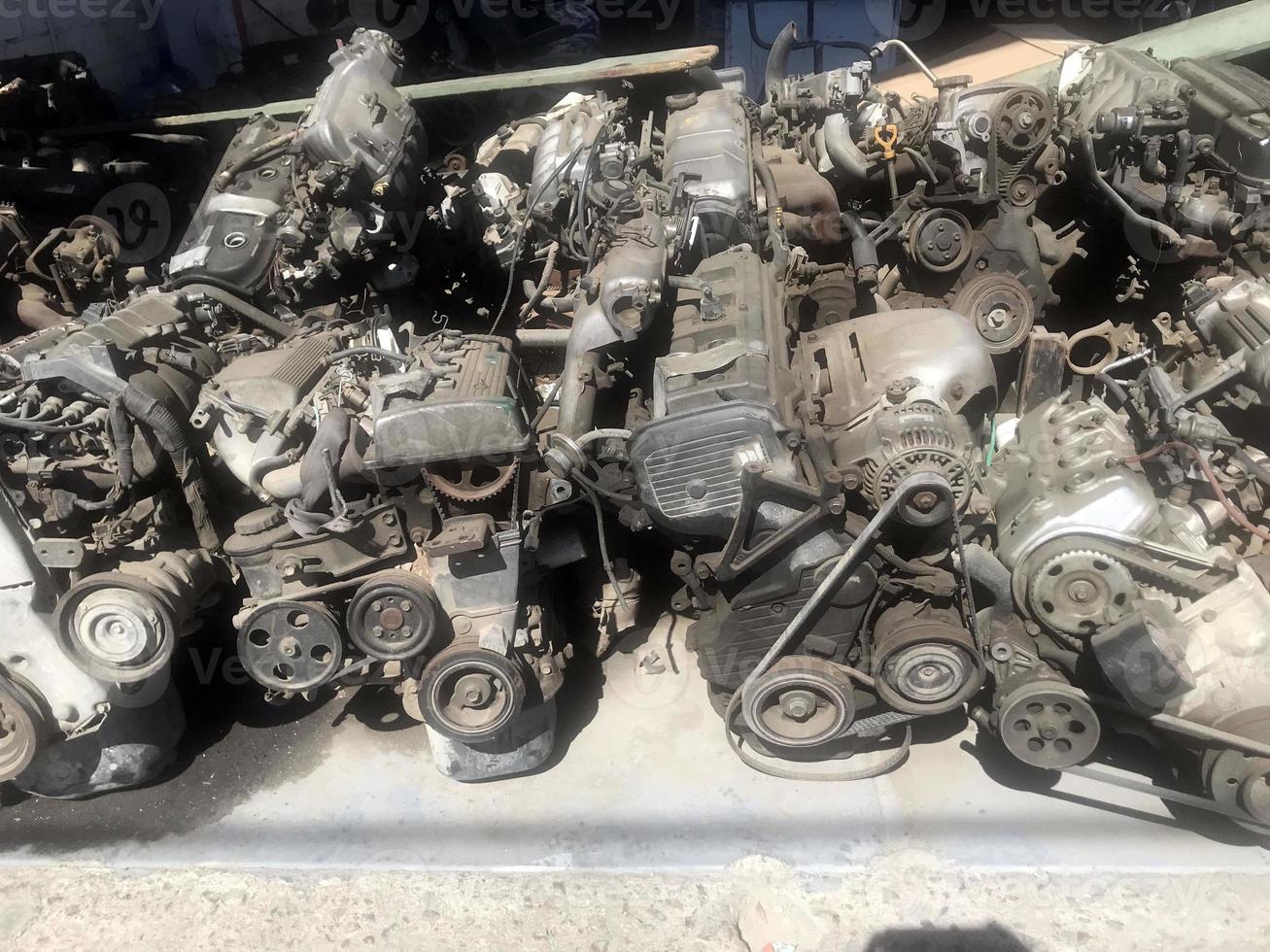 many old used car engine and parts 20188112 Stock Photo at Vecteezy
