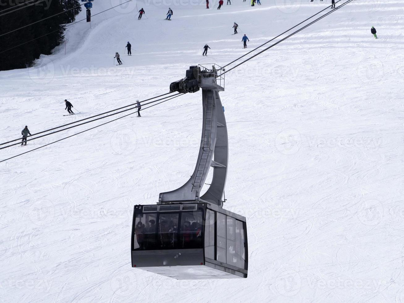 cable way in dolomites gardena valley snow mountains photo
