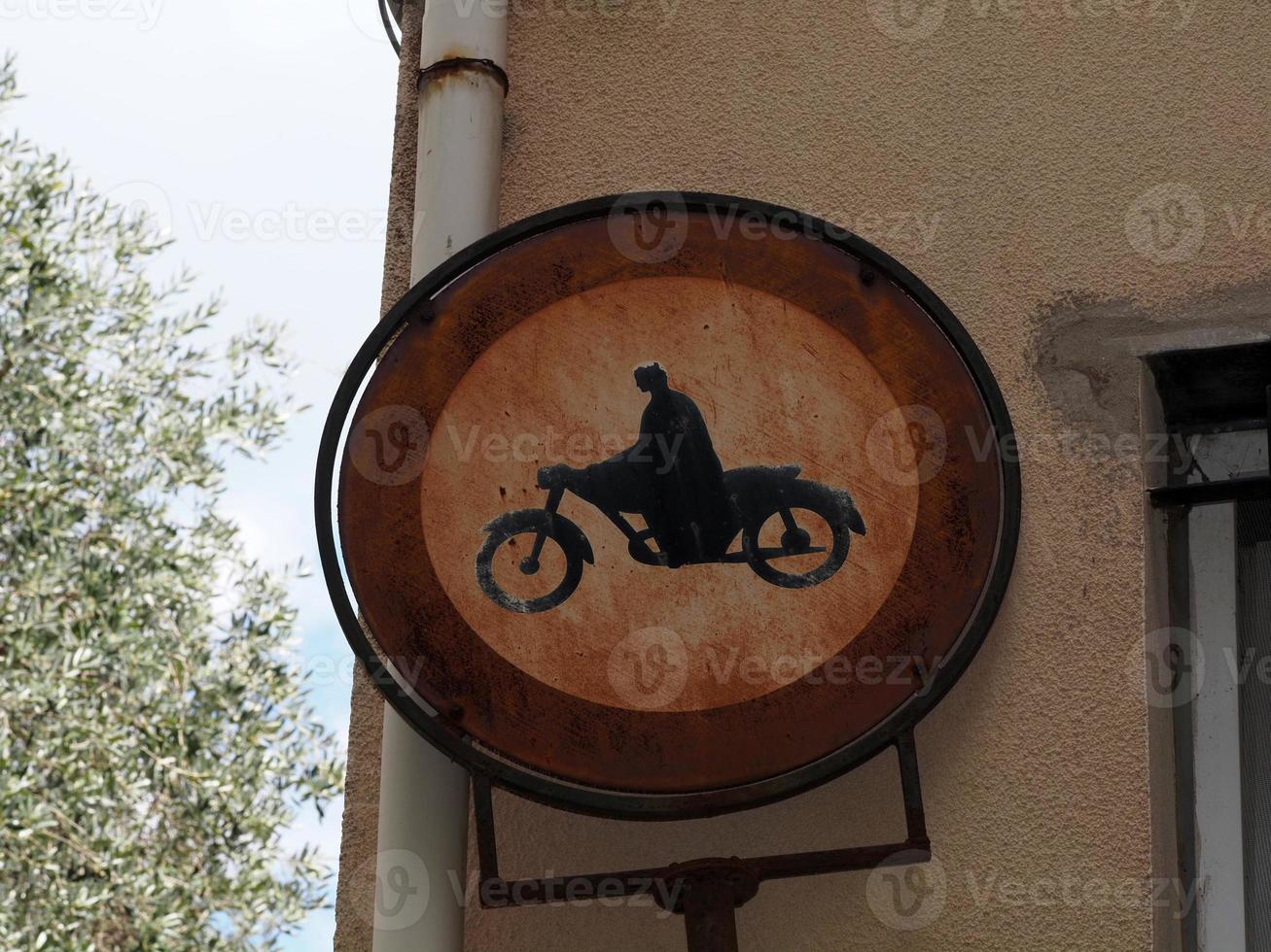 very old no motorbike passing road sign photo