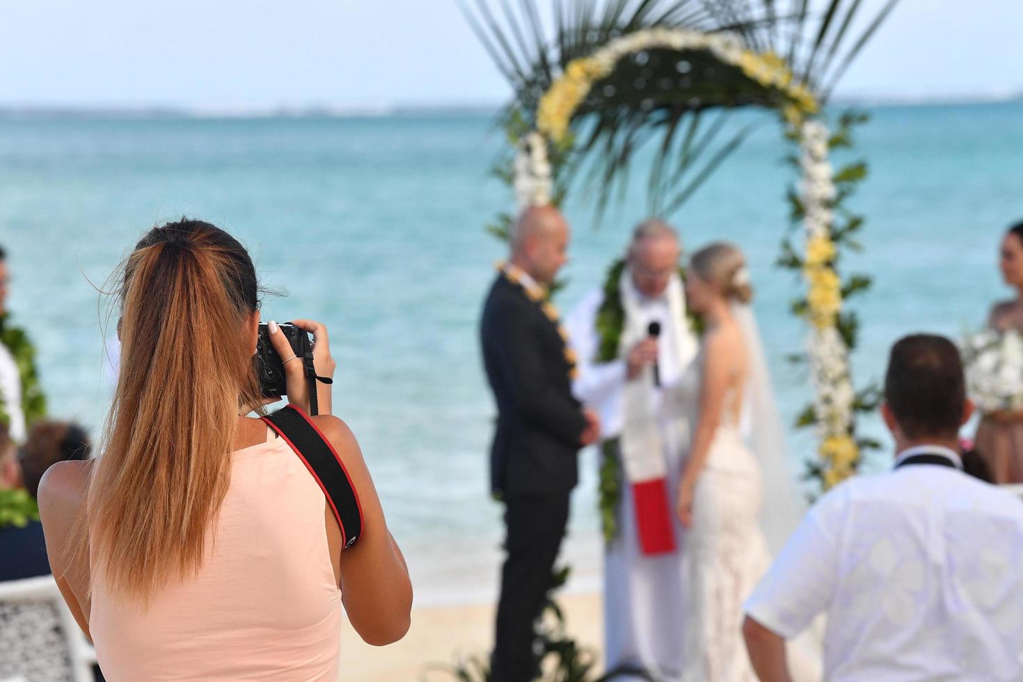 RAROTONGA, COOK ISLANDS - AUGUST 19, 2017 - Wedding on tropical paradise sandy beach photo