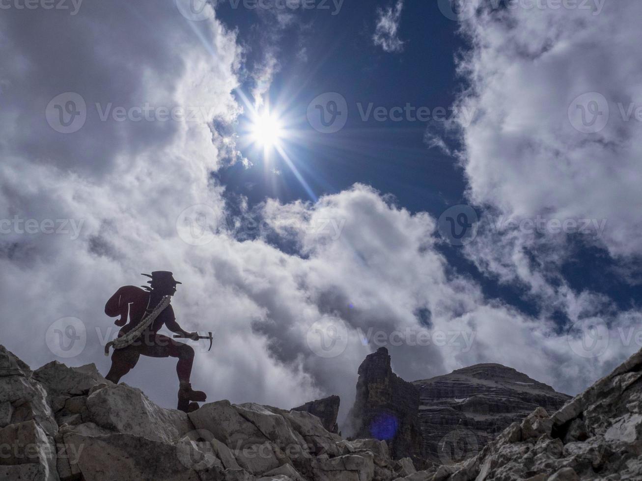 alpinist silhouette in tofane dolomites mountains panorama photo