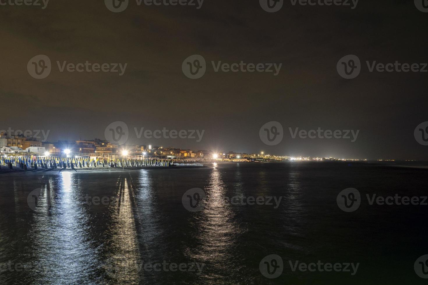 Ostia Rome Italy sea promenade at night view from pier photo