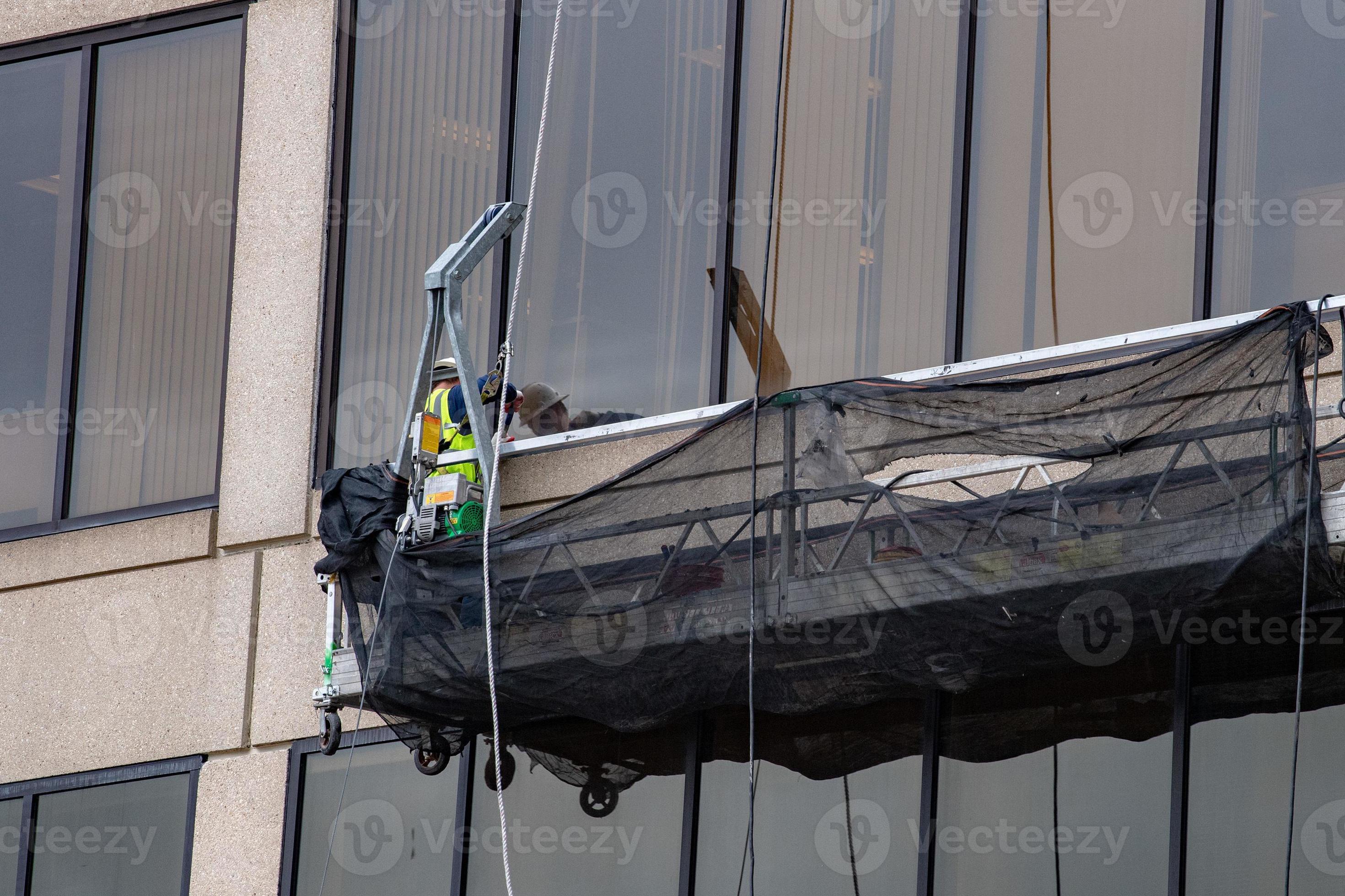 skyscraper windows cleaning in manhattan 20199936 Stock Photo at Vecteezy
