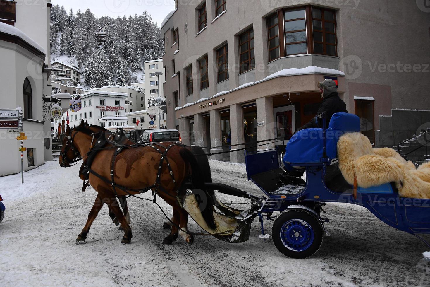 ST MORITZ, SWITZERLAND - DECEMBER 30 2017 - Luxury town crowded of tourists for new years eve photo