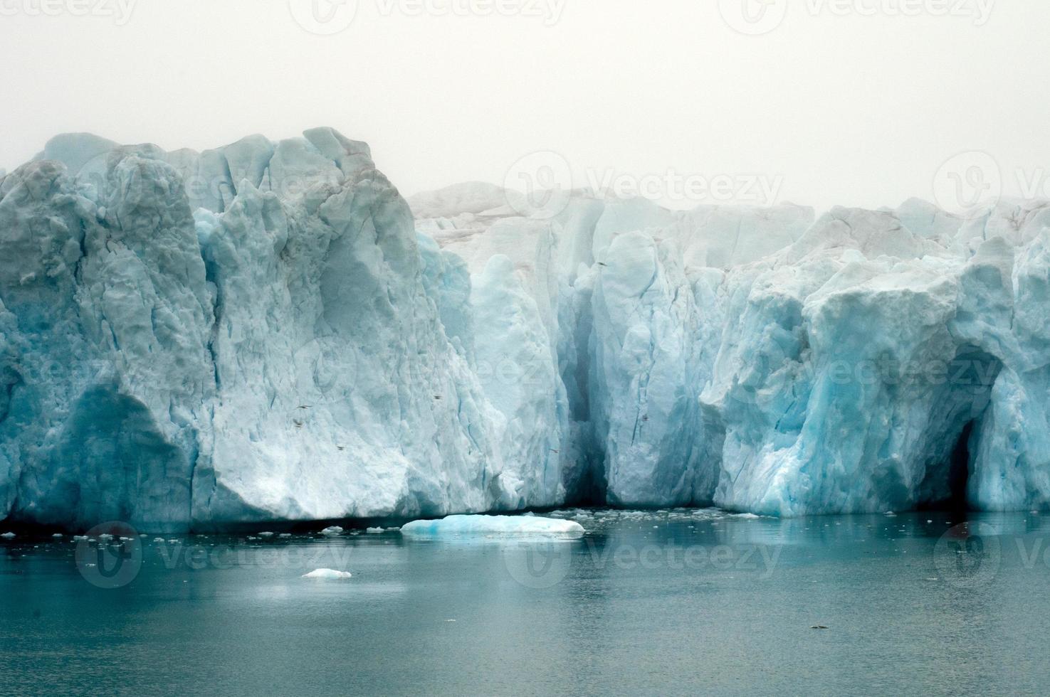 pitzbergen Glacier view on foggy day photo