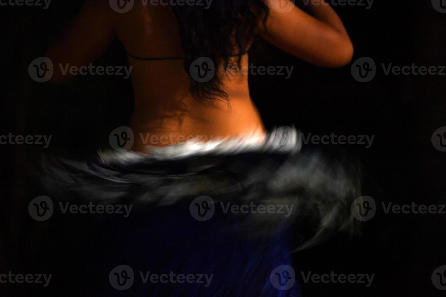 Polynesian dancer hula move effect photo