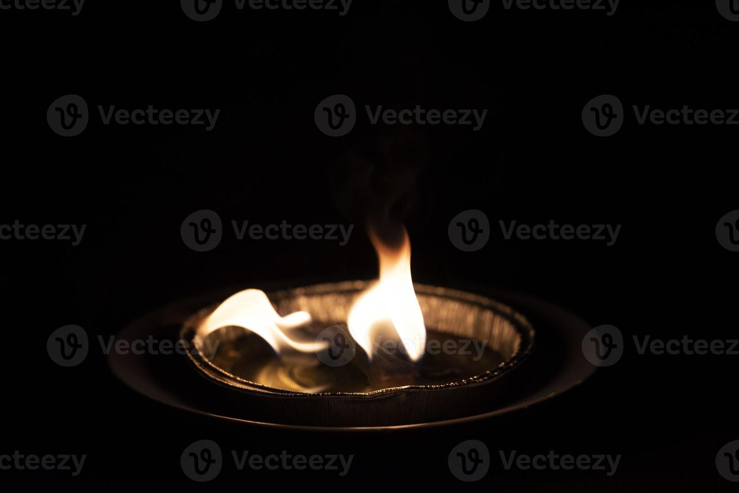 red flame on black background photo