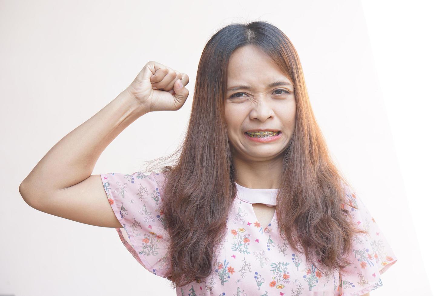 Asian woman is furious towards colleague photo