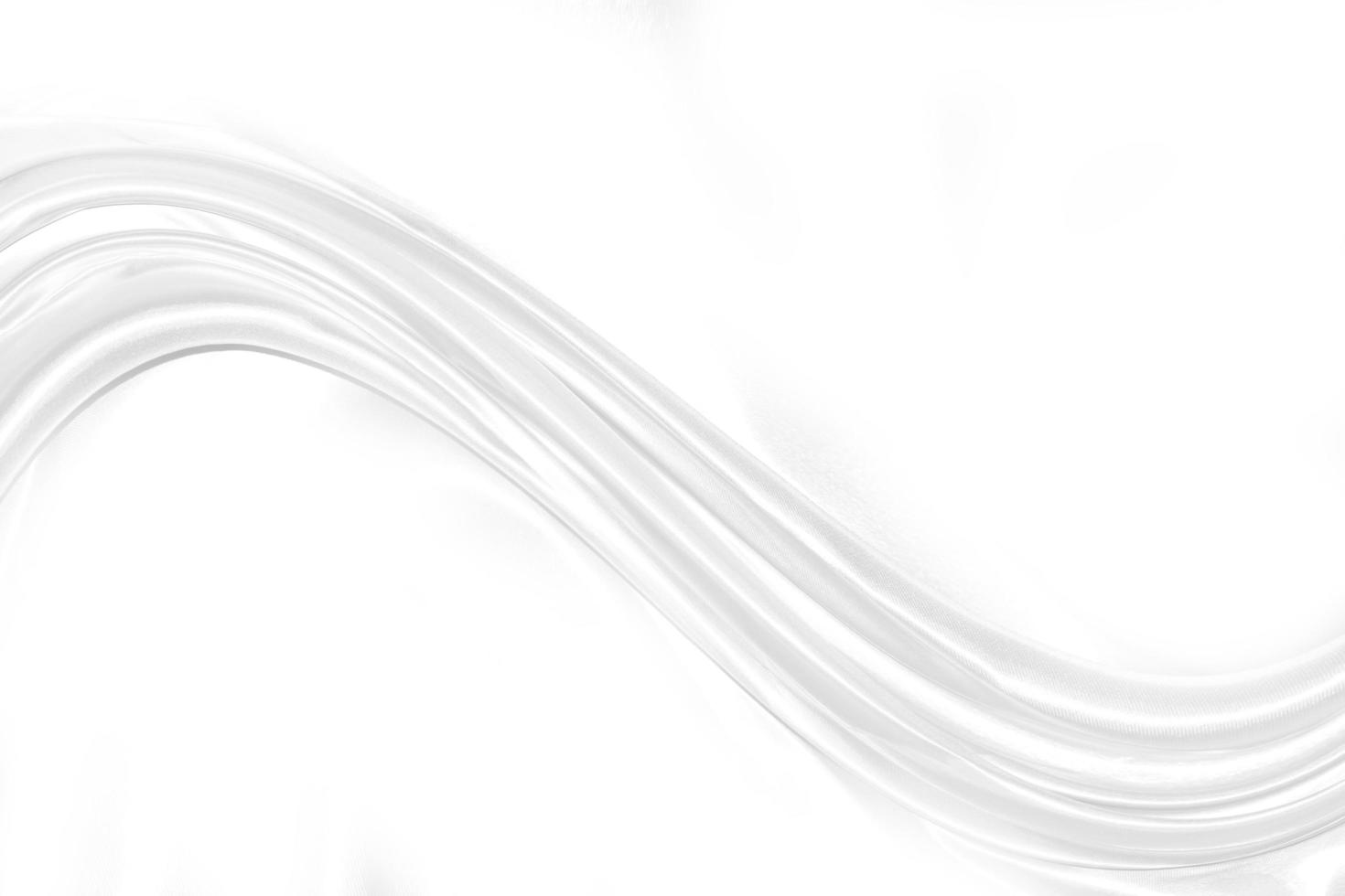 Closeup elegant crumpled of white silk fabric cloth background and texture photo