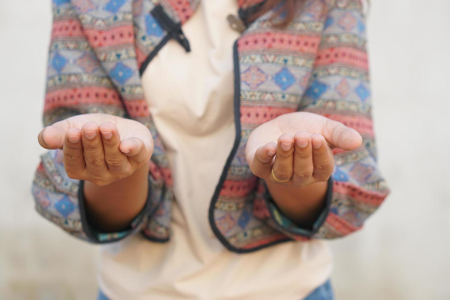 Asian woman praying to god photo