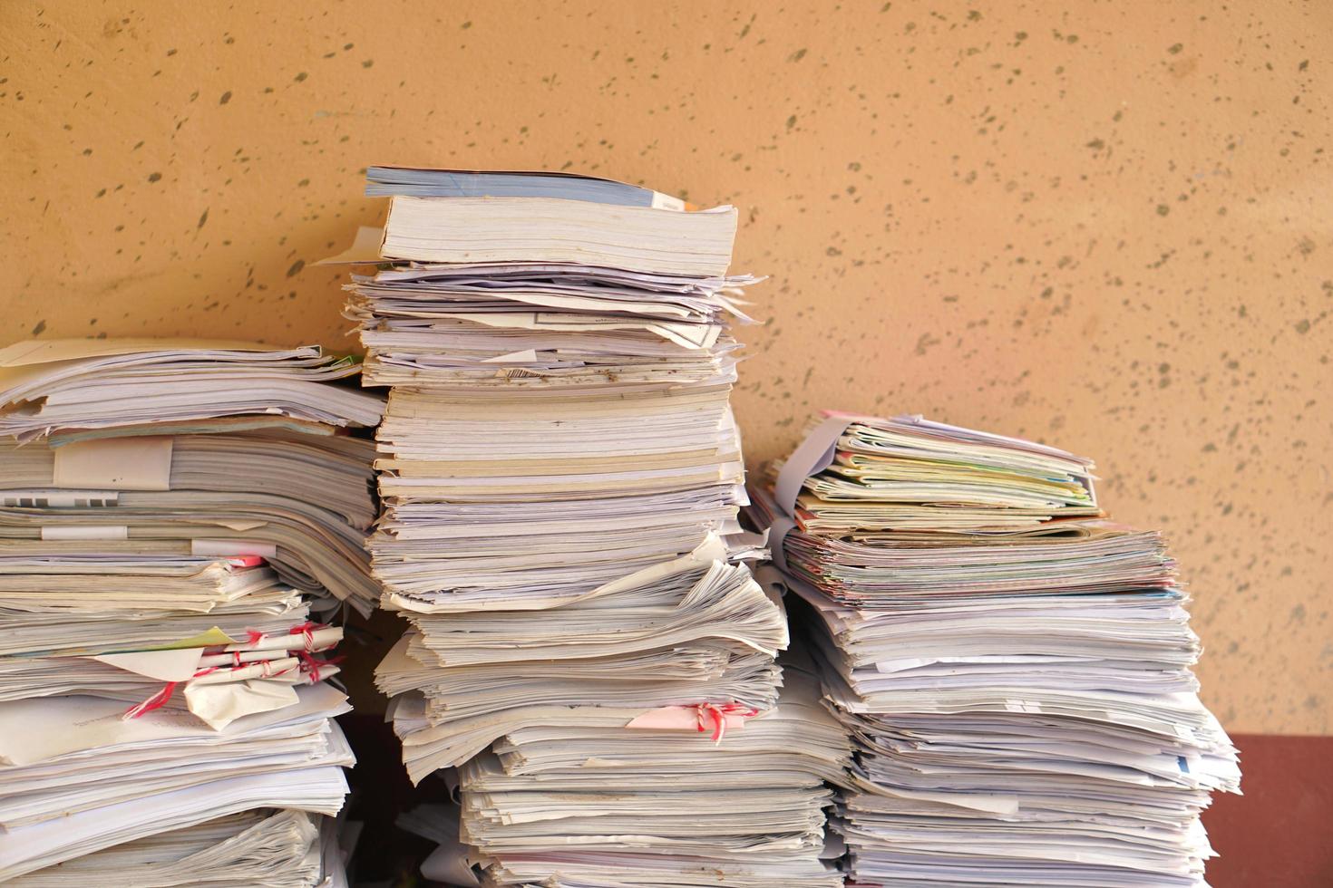 pile of old books and documents photo