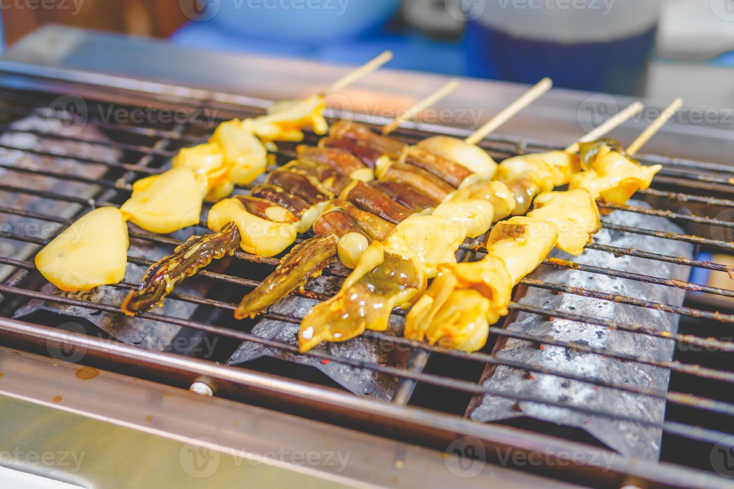 grilled squid skewers that is roasting on the stove 20203736 Stock