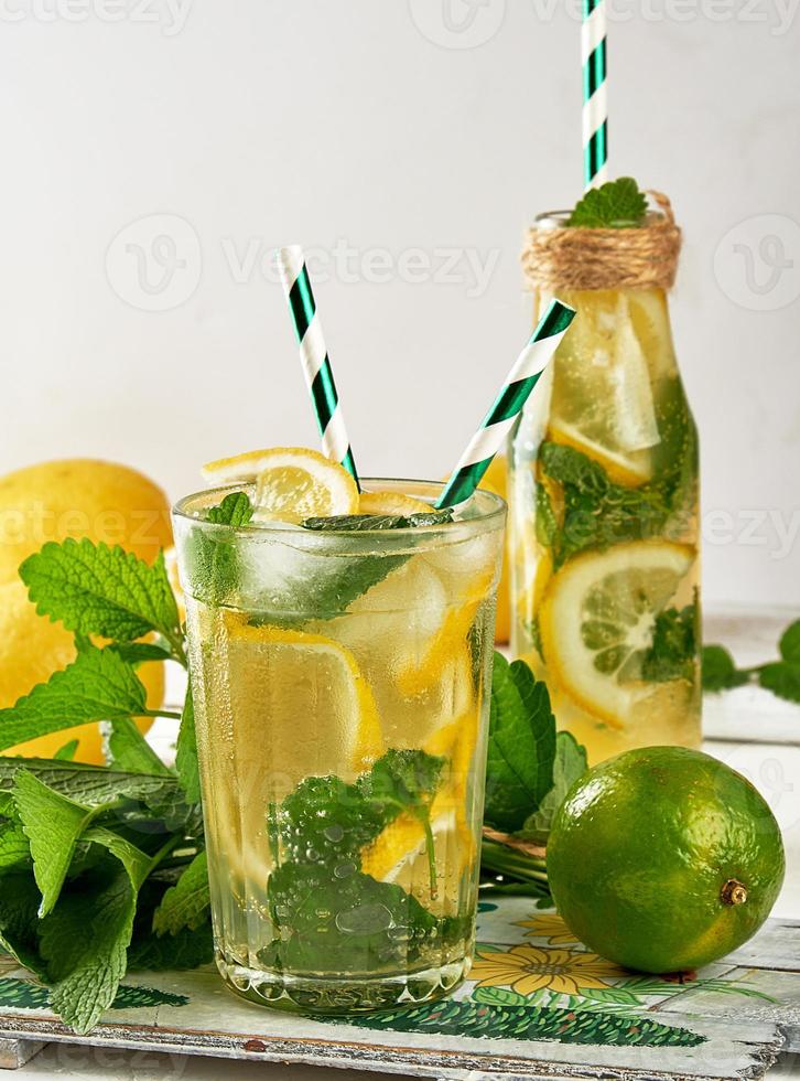 refreshing drink lemonade with lemons photo