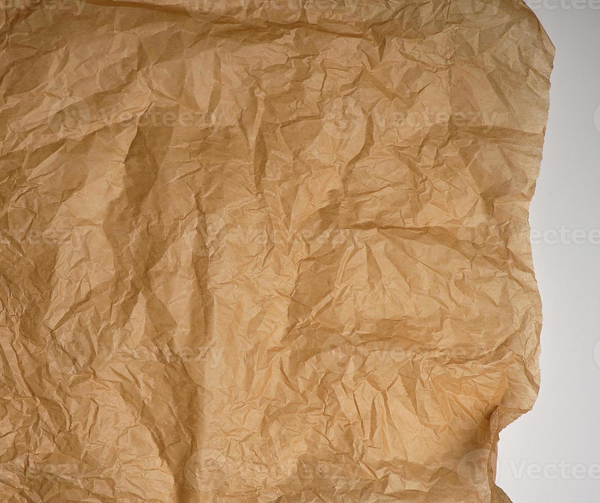 crumpled brown baking parchment paper photo