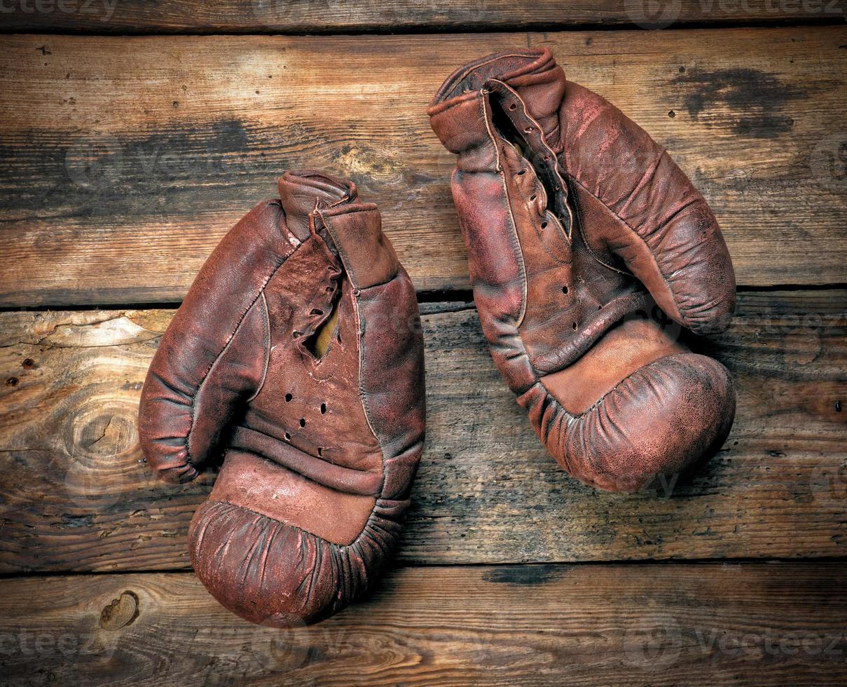 very old leather brown boxing gloves photo