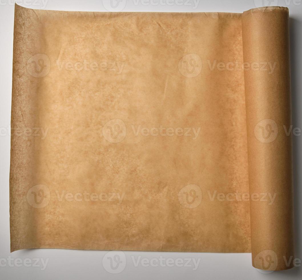 brown parchment baking paper wound into a large roll photo